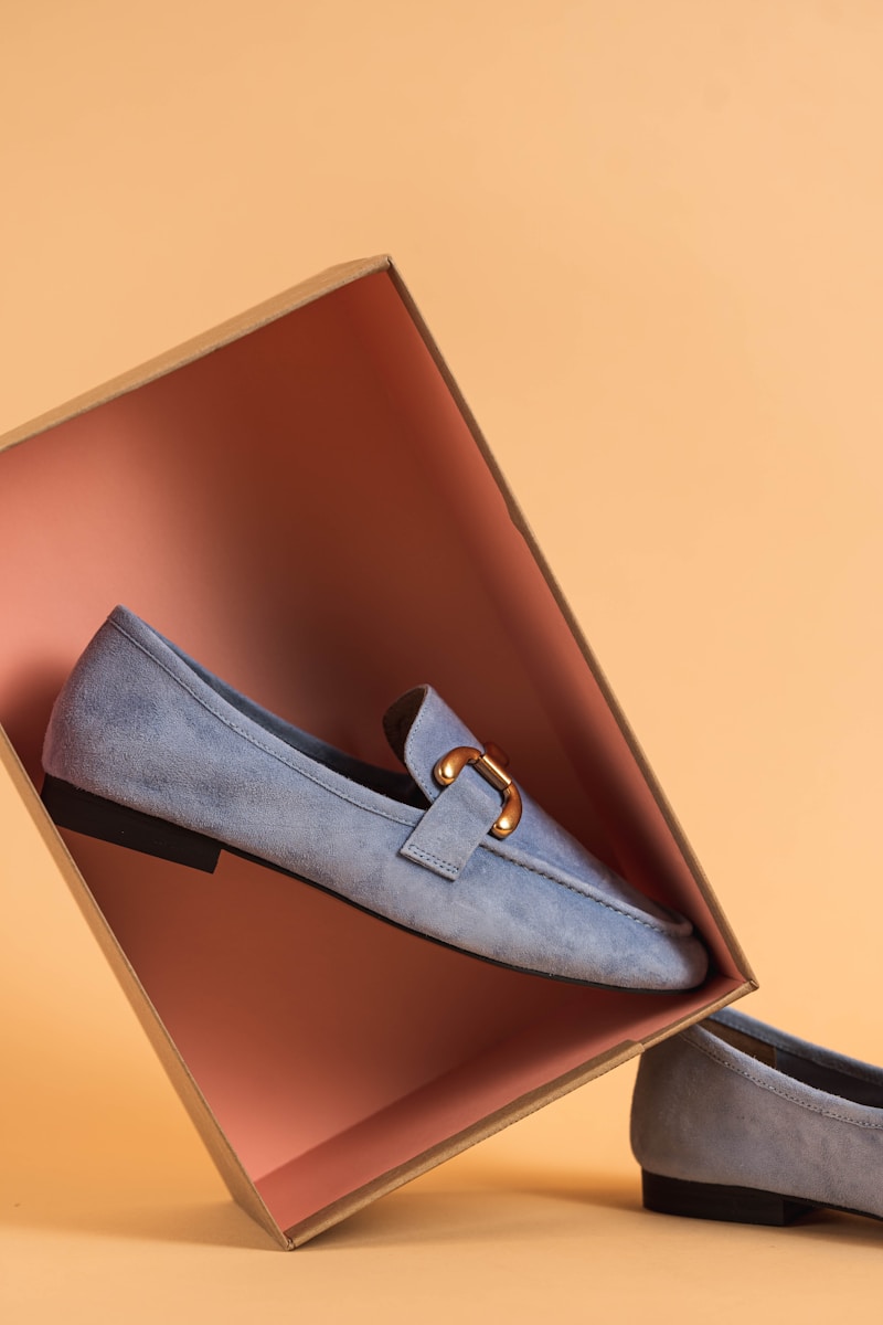a pair of shoes sitting inside of a box